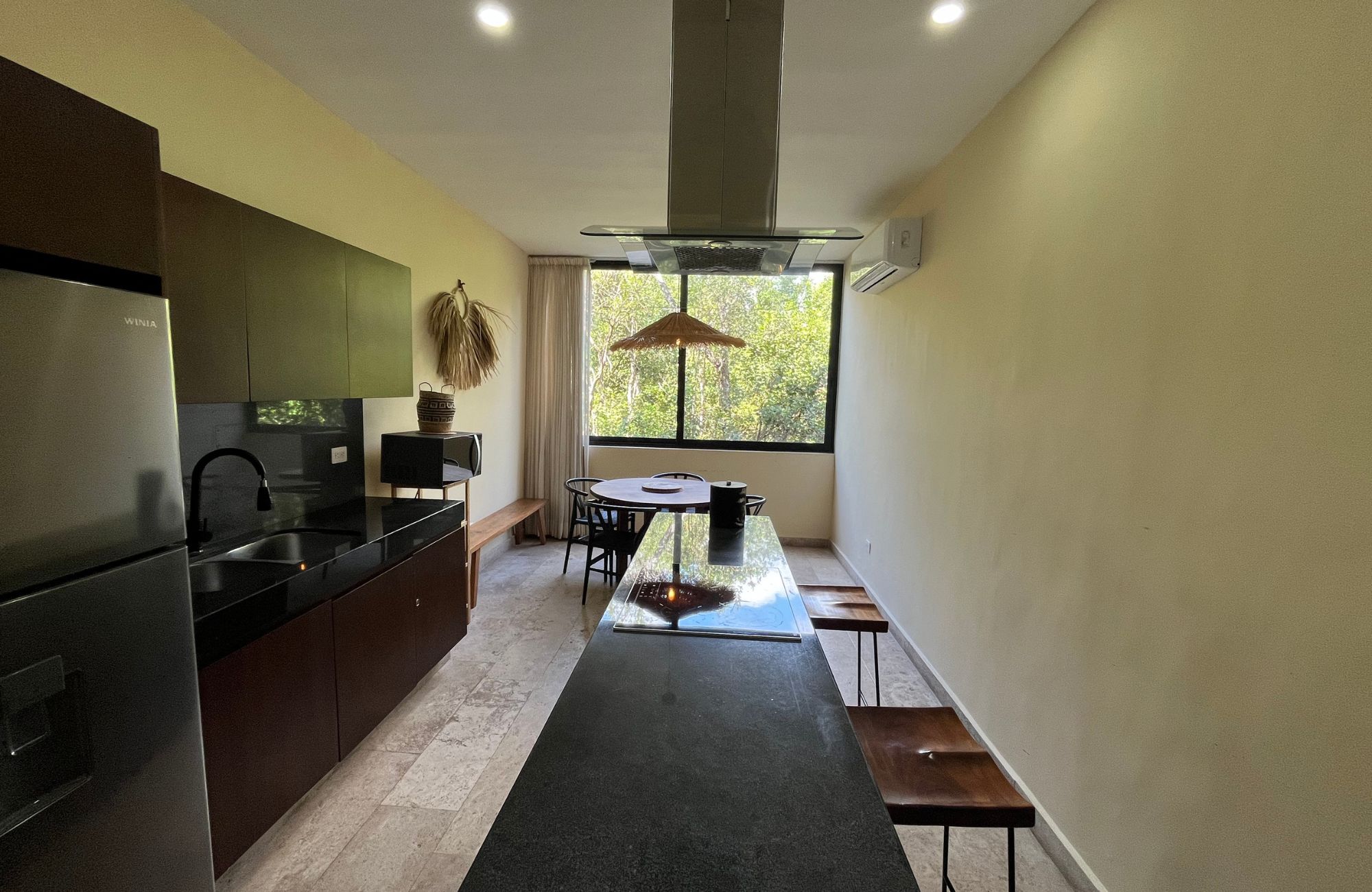 Penthouse steps from the ocean with beach club in Akumal Tulum