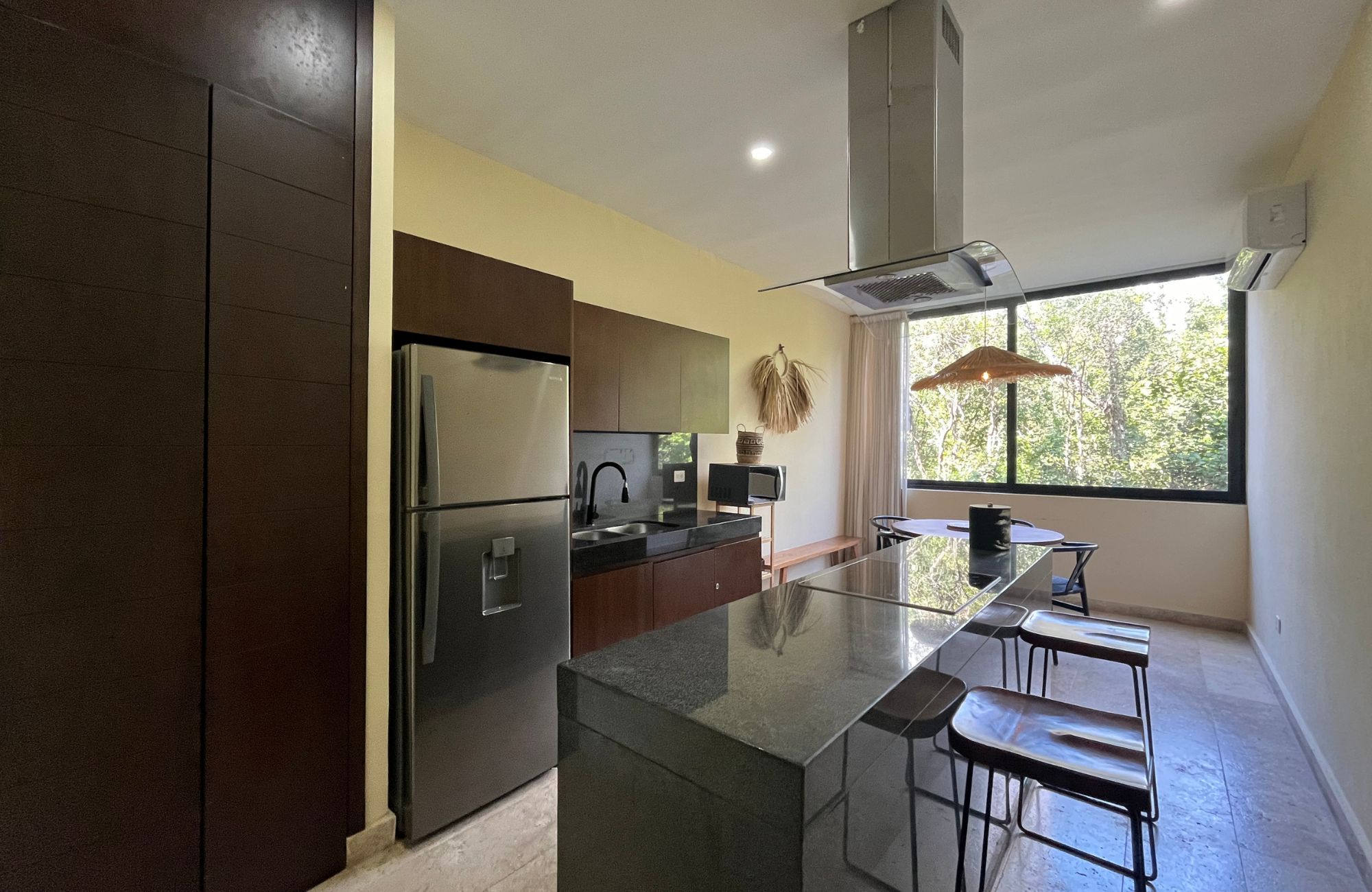 Penthouse steps from the ocean with beach club in Akumal Tulum