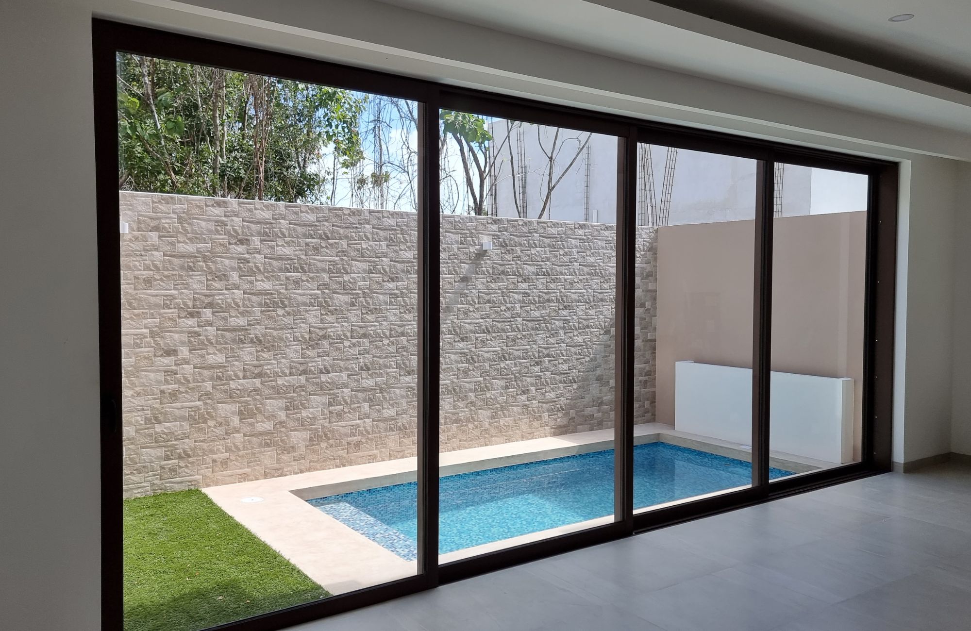 House with private pool, high ceilings for sale in Aqua gated community, Cancun.