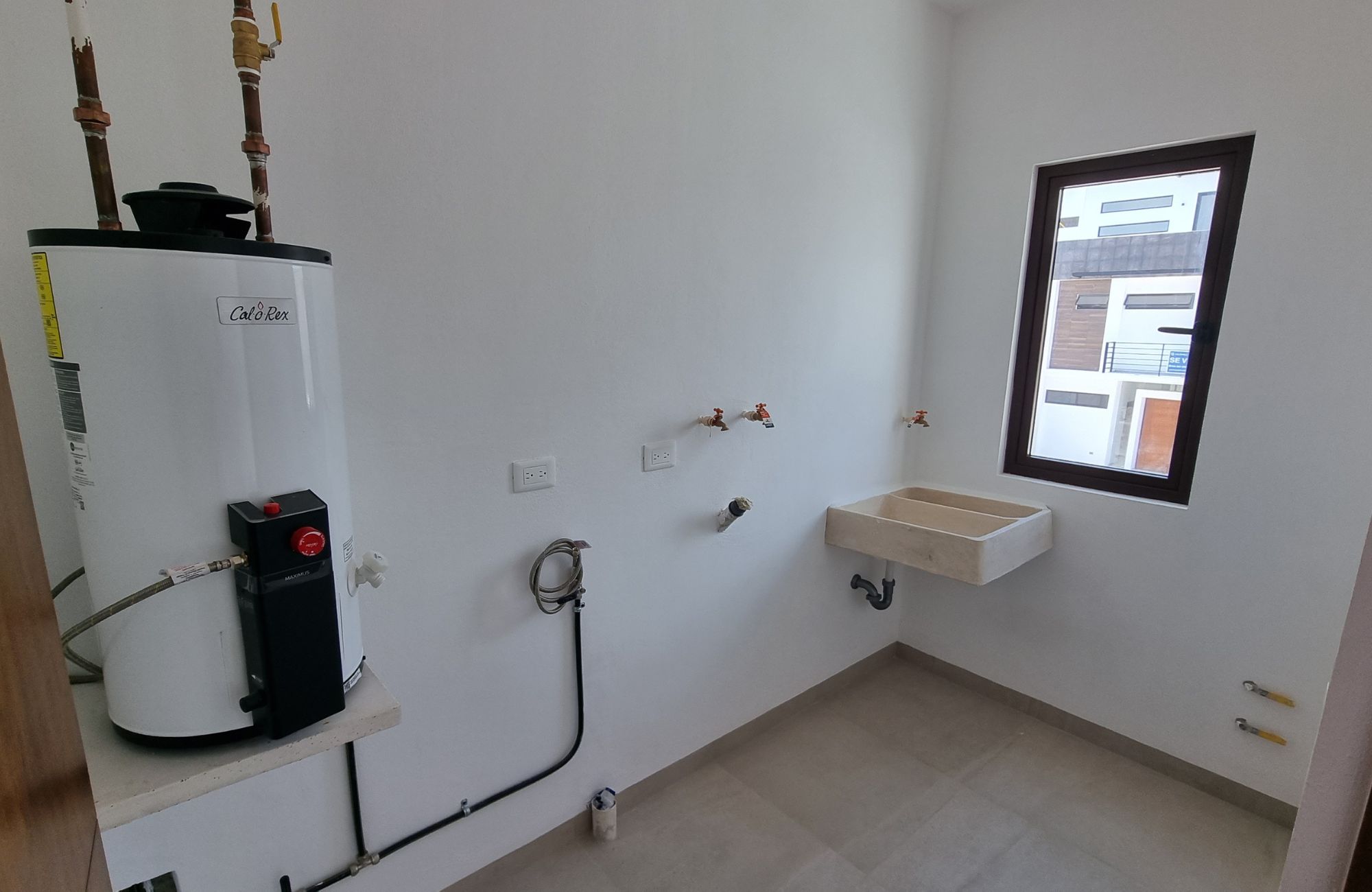 House with private pool, high ceilings for sale in Aqua gated community, Cancun.