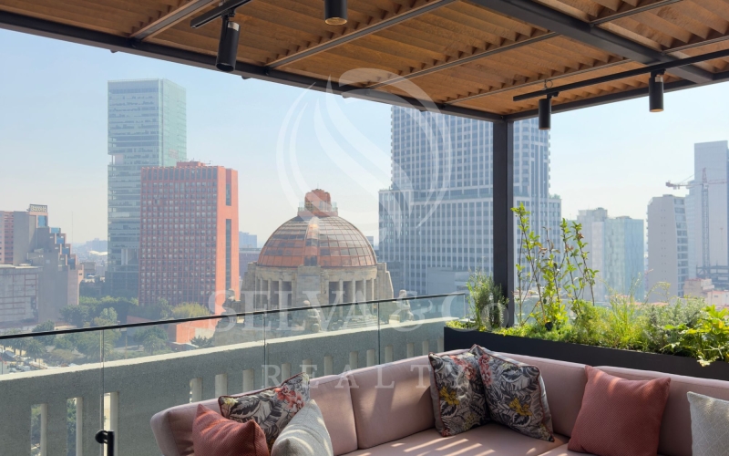 Condo for sale with balcony and views of the Monument to the Revolution