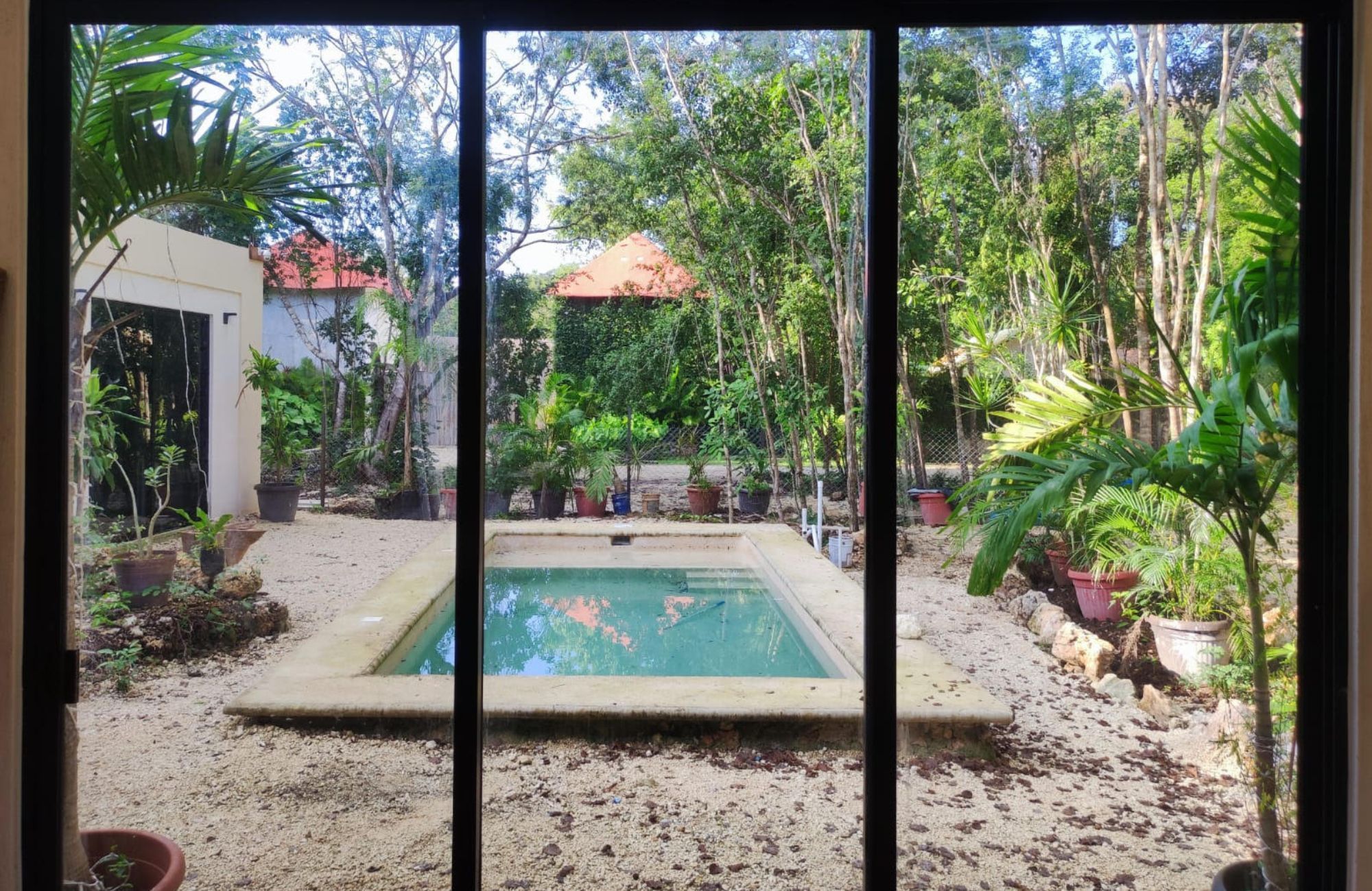 Luxury house with private pool, Green views, clubhouse with sports fields, in gated community Aqua, Cancun, for sale.