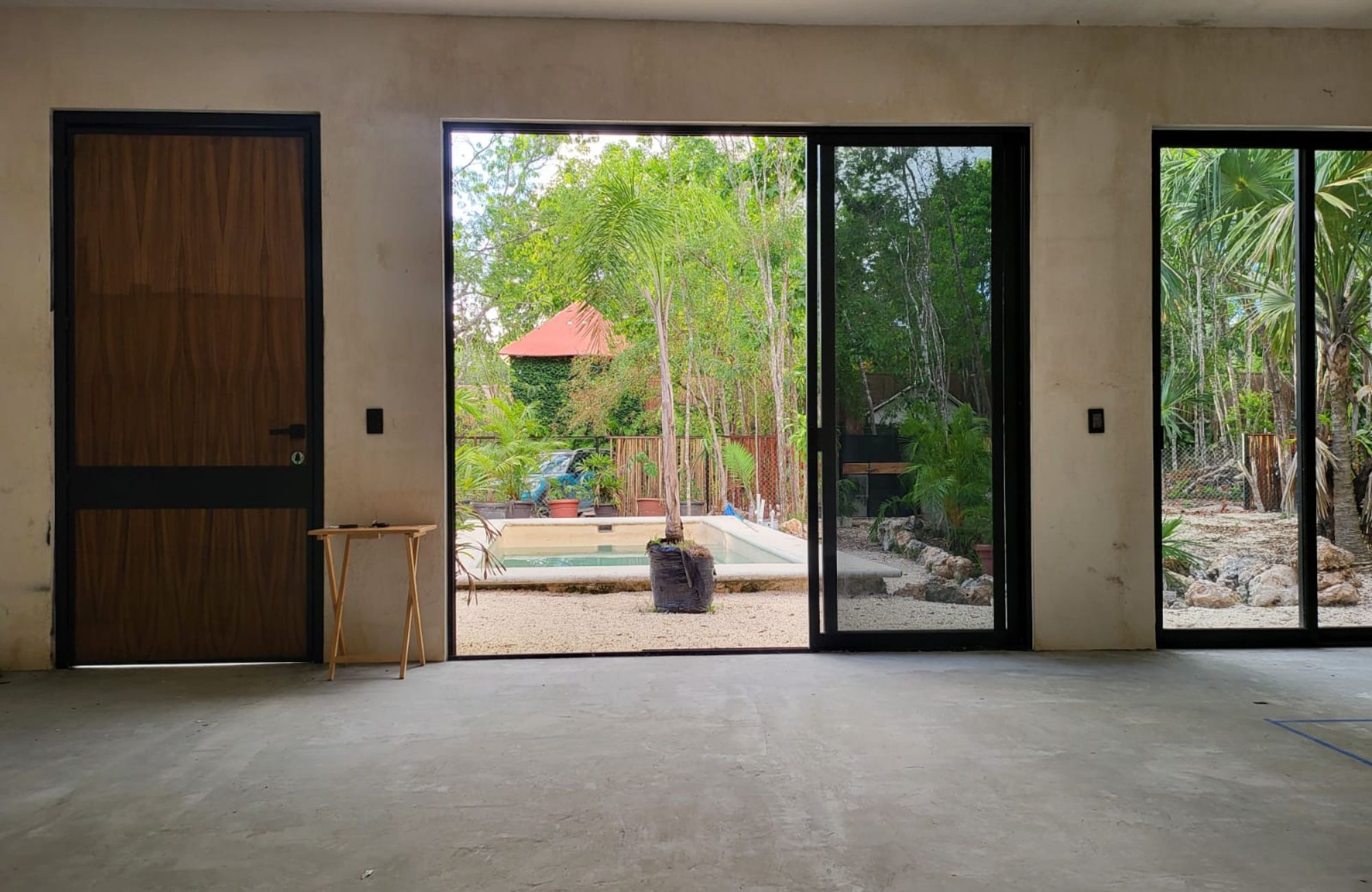 Luxury house with private pool, Green views, clubhouse with sports fields, in gated community Aqua, Cancun, for sale.