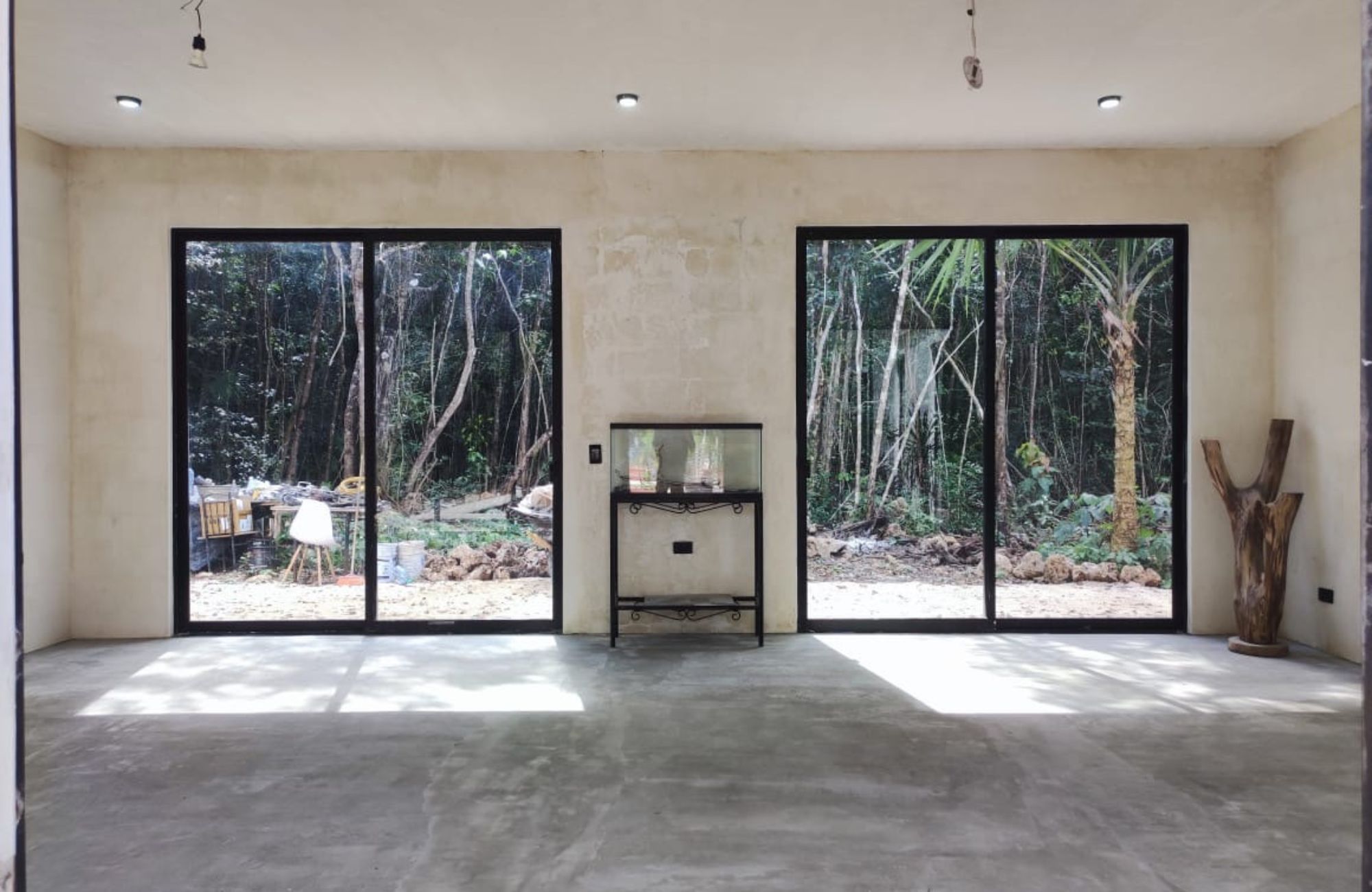 Luxury house with private pool, Green views, clubhouse with sports fields, in gated community Aqua, Cancun, for sale.
