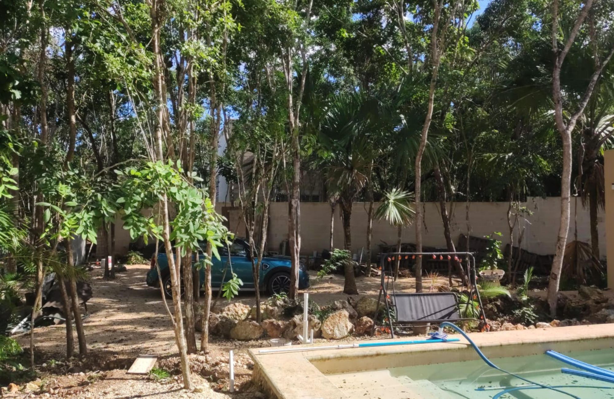 Luxury house with private pool, Green views, clubhouse with sports fields, in gated community Aqua, Cancun, for sale.