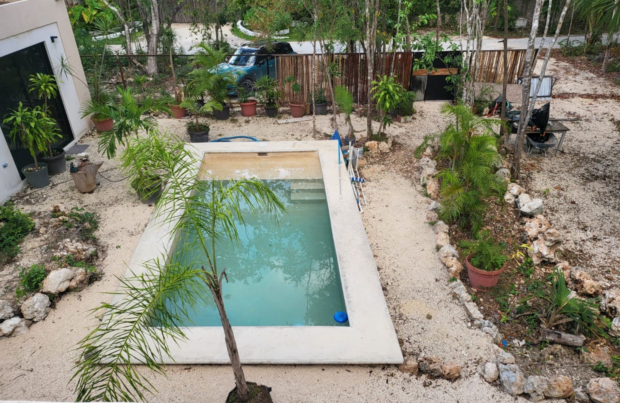 Luxury house with private pool, Green views, clubhouse with sports fields, in gated community Aqua, Cancun, for sale.