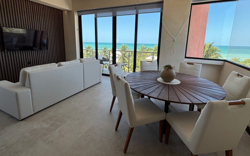Condo steps from the sea with amenities, for sale