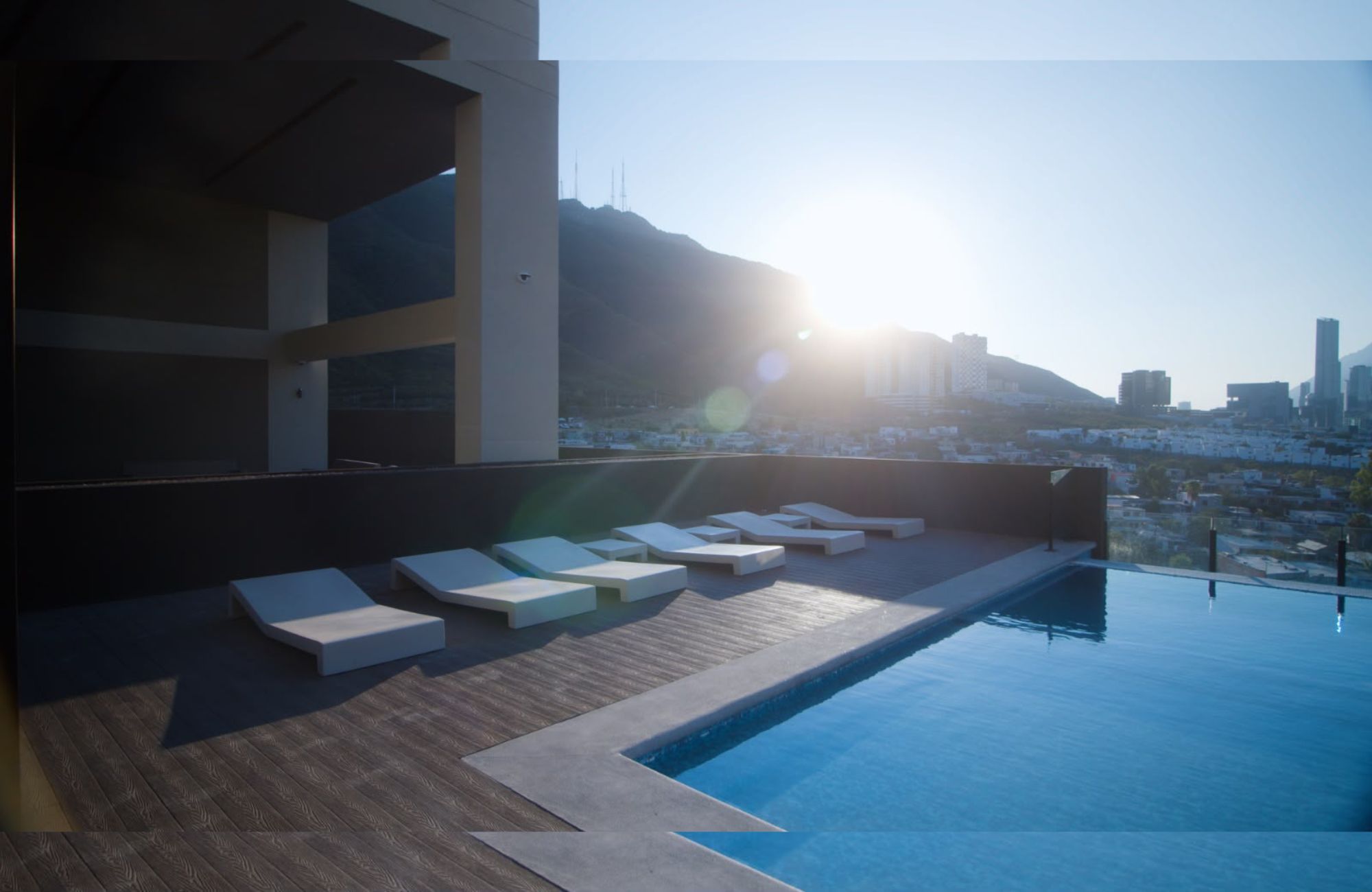 Condominium for sale featuring a rooftop, swimming pool, garden, bar, and billiards lounge