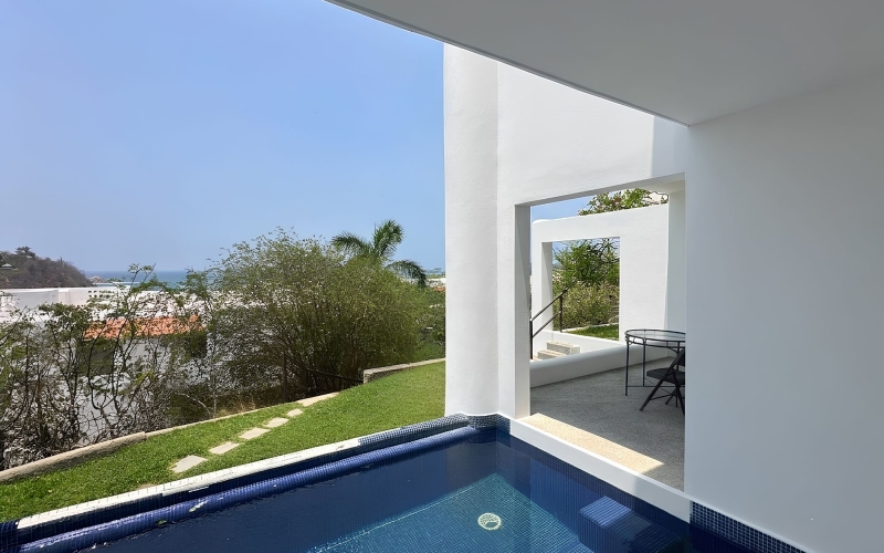 Condo with a private pool inside Camino Real Zaashila Resort with direct beach access