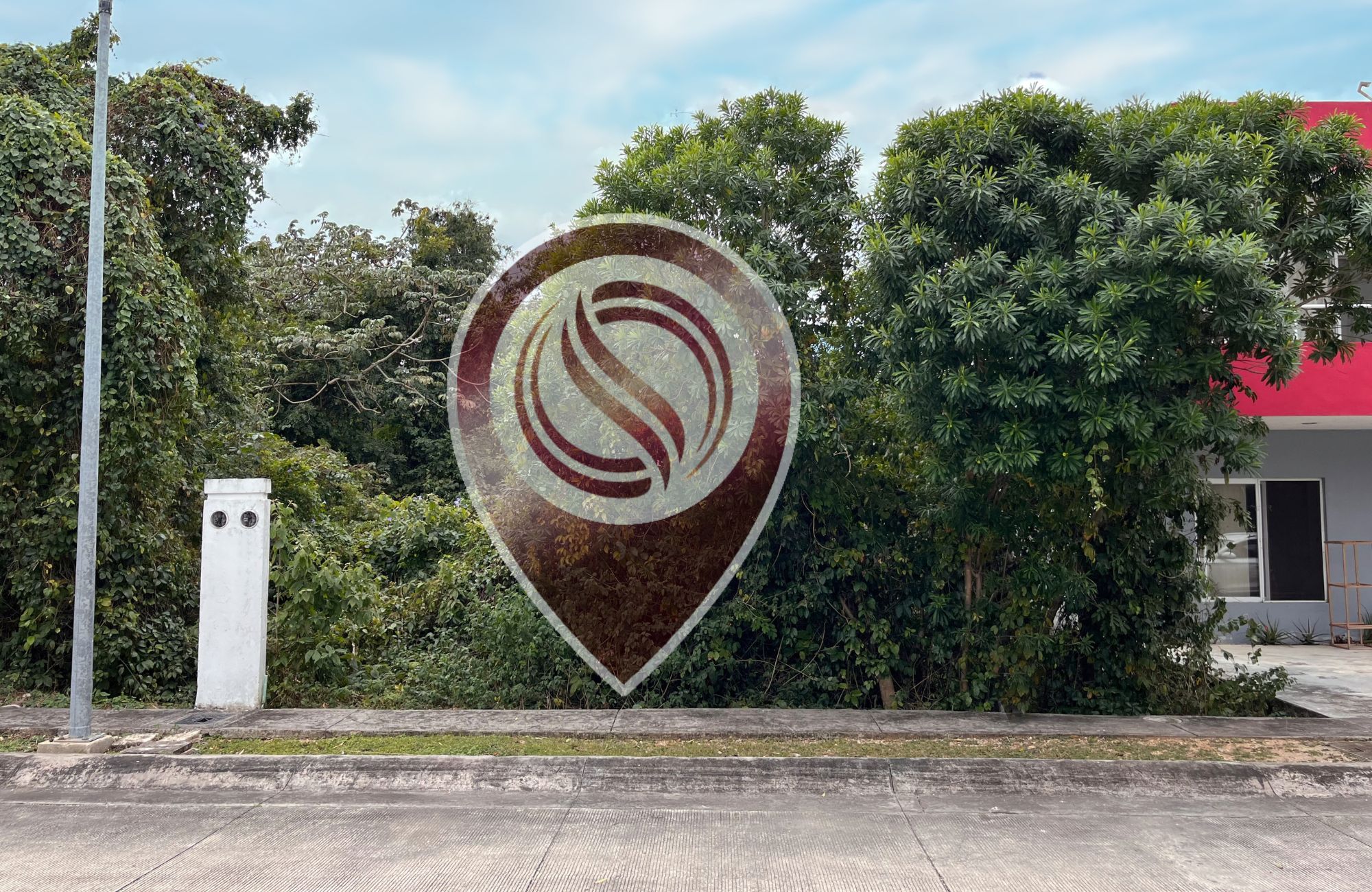 Single-Family Lot in Exclusive Gated Community with Many Amenities in Centro Maya Area, Playa del Carmen.