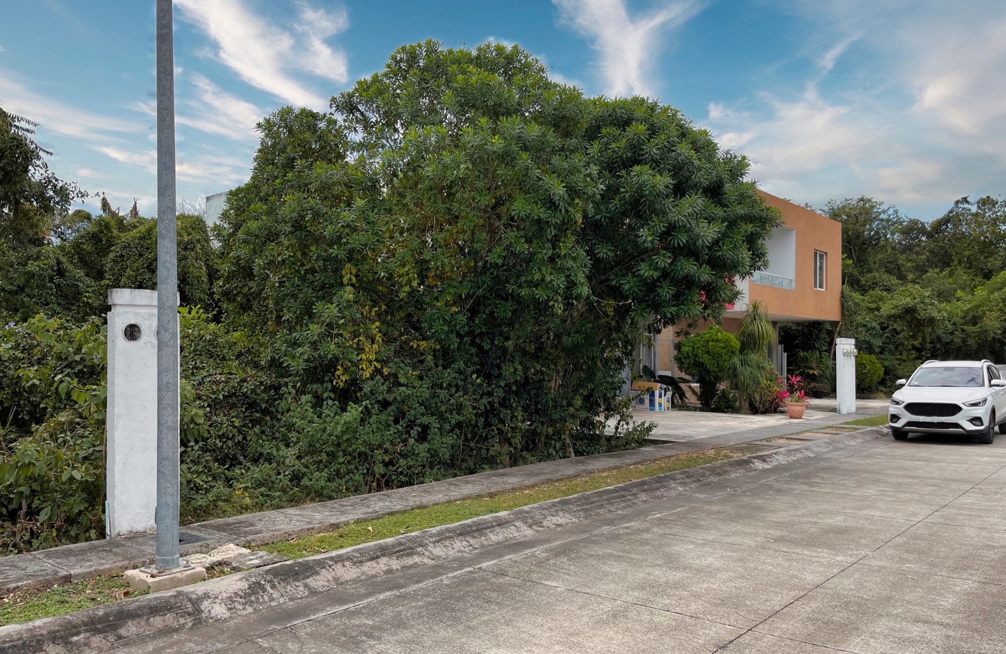 Single-Family Lot in Exclusive Gated Community with Many Amenities in Centro Maya Area, Playa del Carmen.