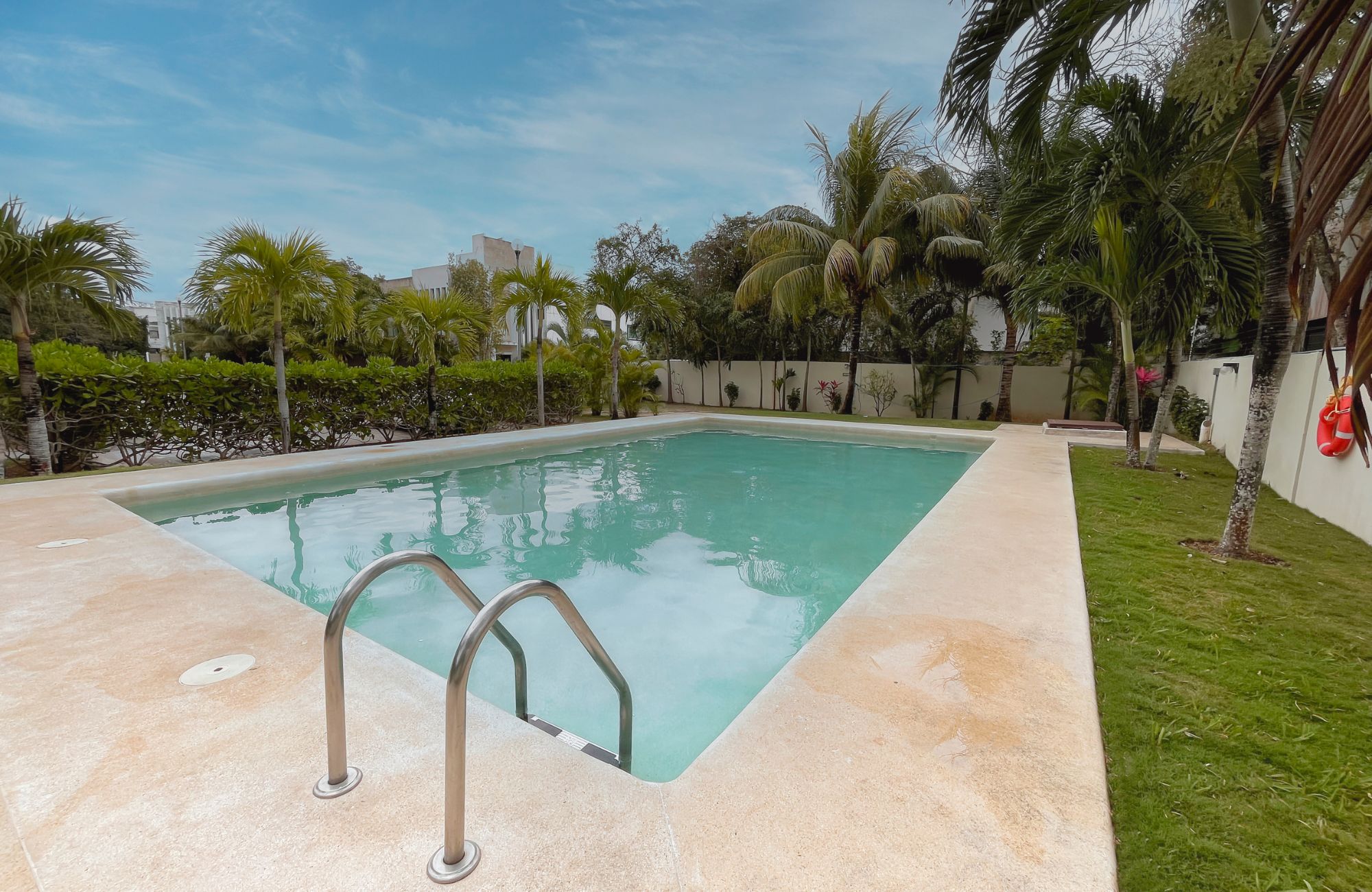 Single-Family Lot in Exclusive Gated Community with Many Amenities in Centro Maya Area, Playa del Carmen.