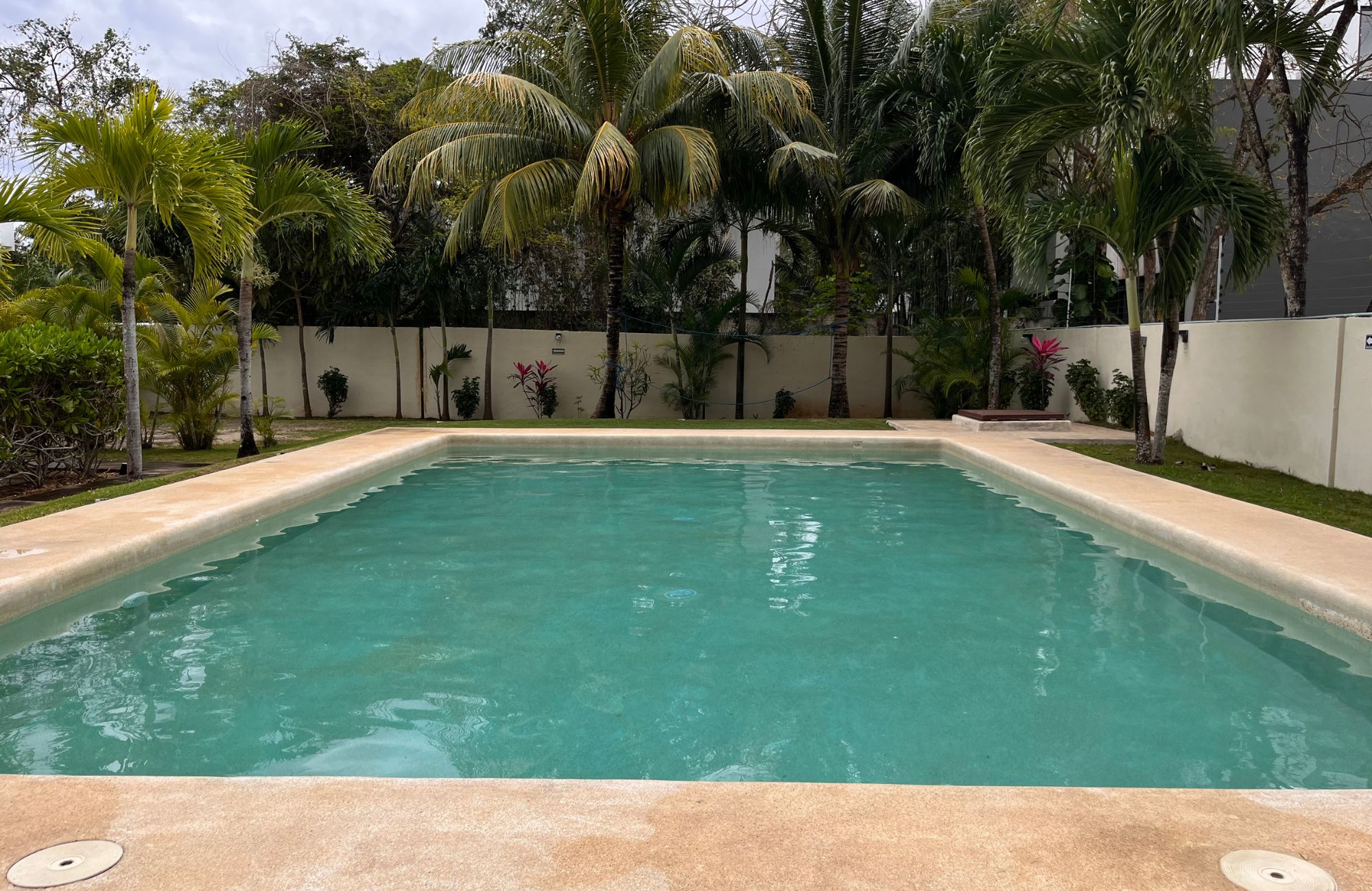 Single-Family Lot in Exclusive Gated Community with Many Amenities in Centro Maya Area, Playa del Carmen.