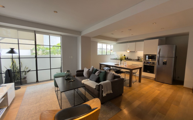 Furnished condo with laundry area, balcony, and amenities, for sale