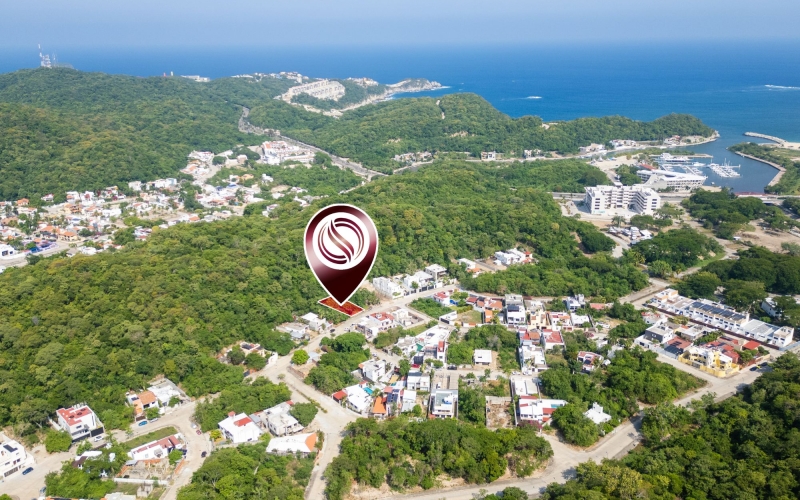 Residential lot bordering a natural area, just minutes from the beach, for sale