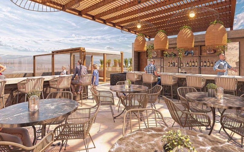 Condo minutes from the beach with outdoor cinema and pickleball court, for sale