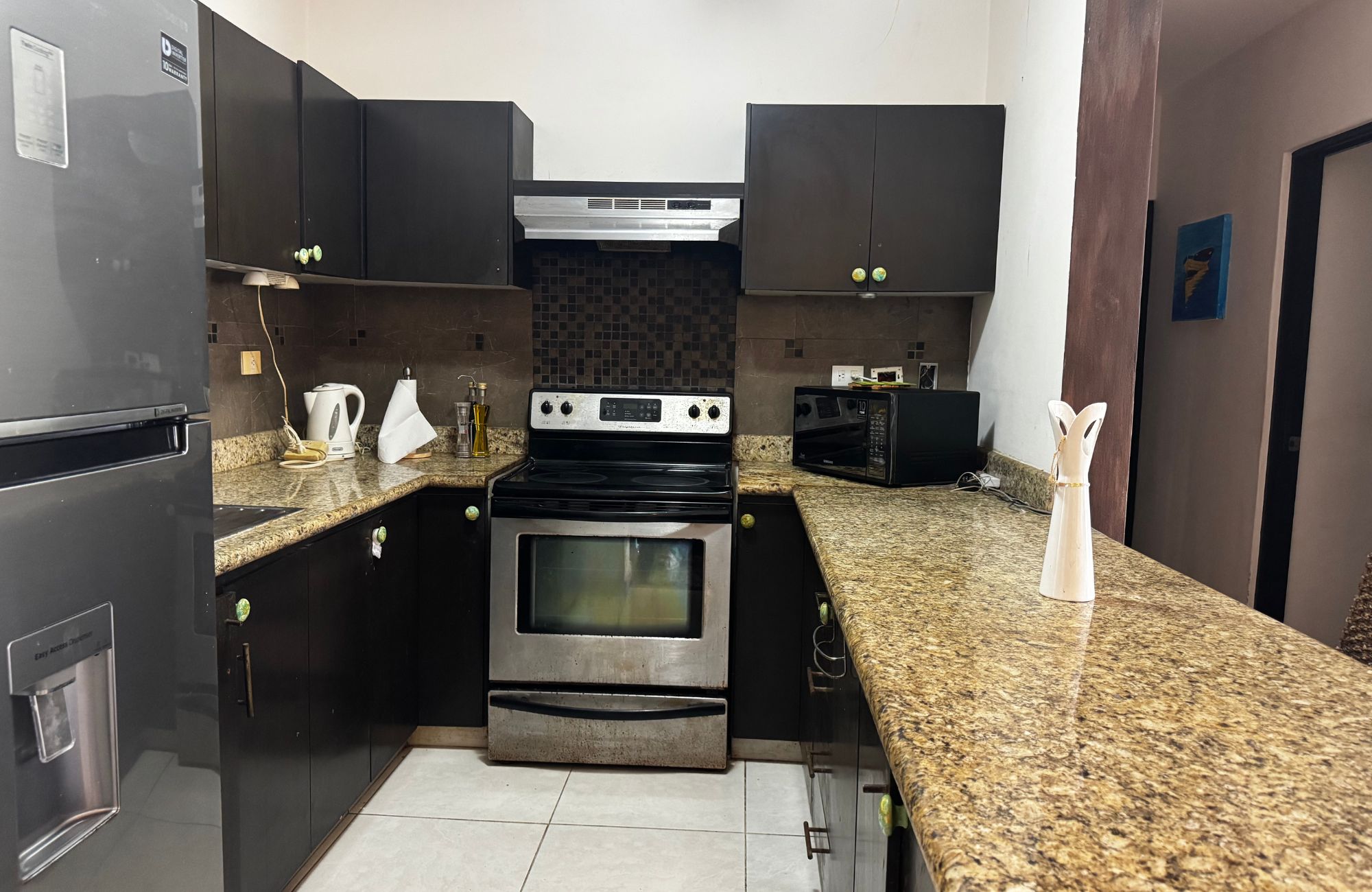 Turn-Key Studio with Ocean View Rooftop, Prime Downtown Playa del Carmen