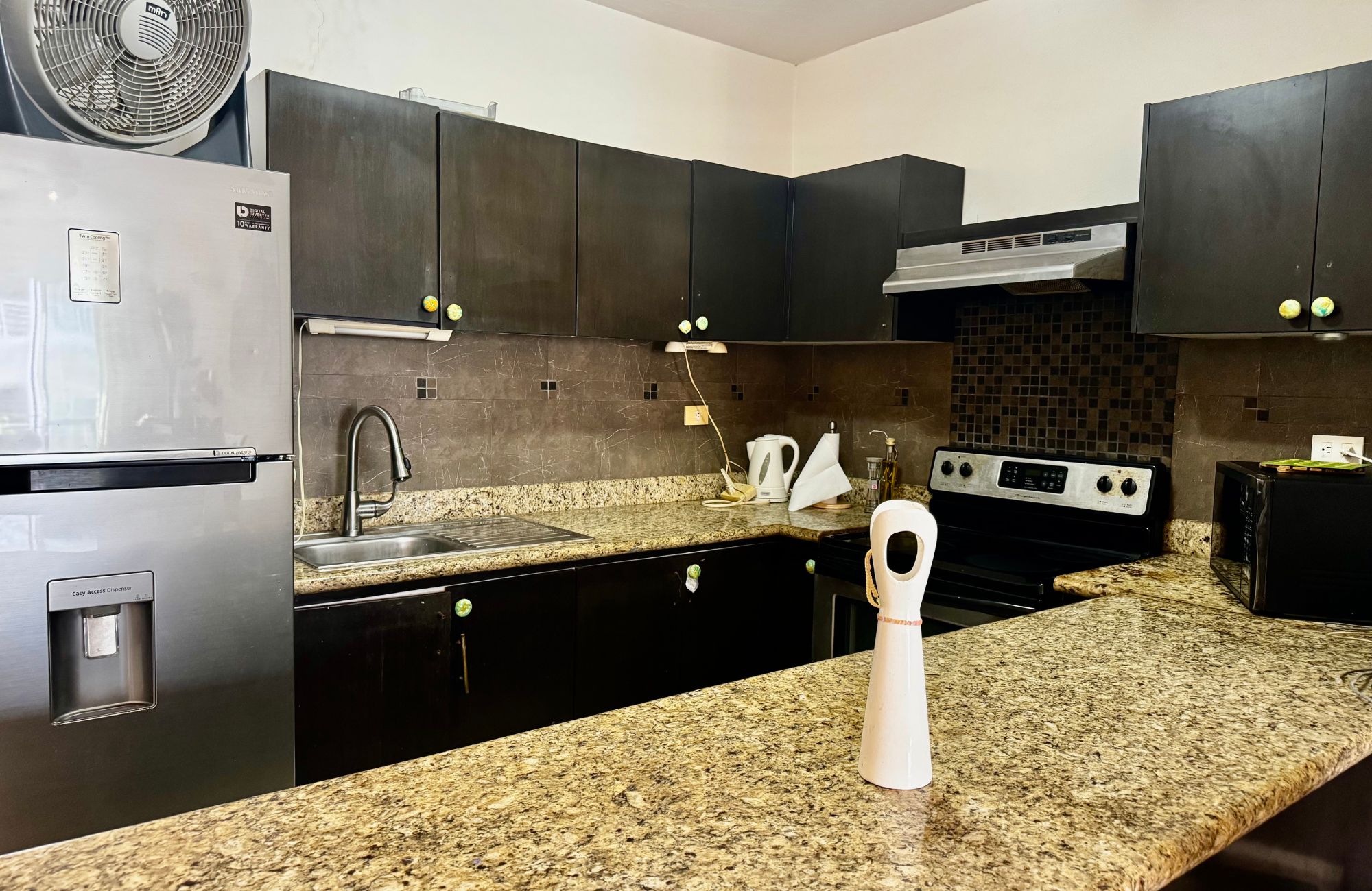 Turn-Key Studio with Ocean View Rooftop, Prime Downtown Playa del Carmen