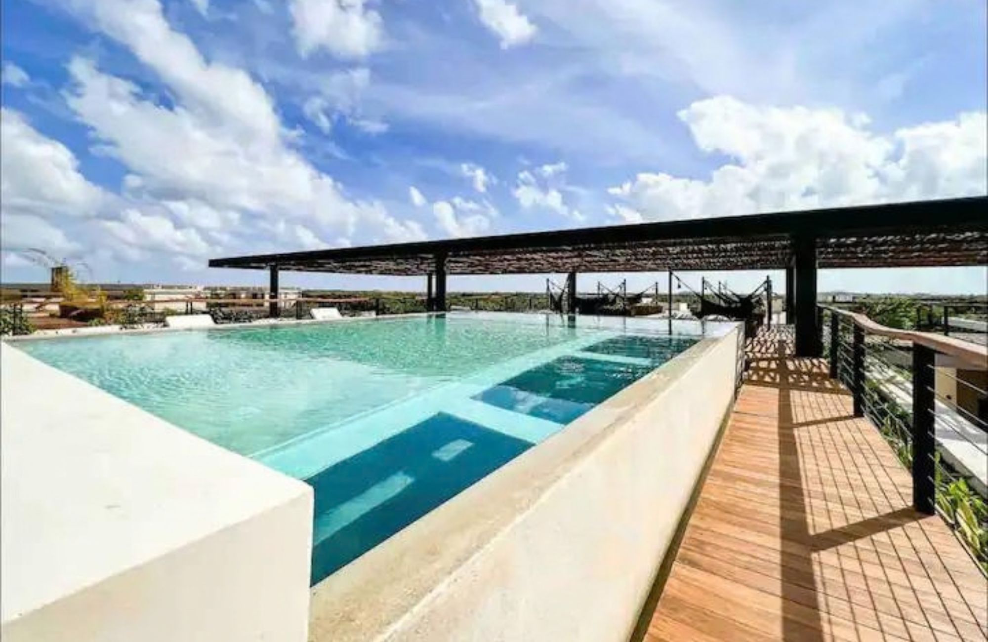 Condo with ocean view terrace, lock-off system, and pool, for sale, Tankah, Tulum.