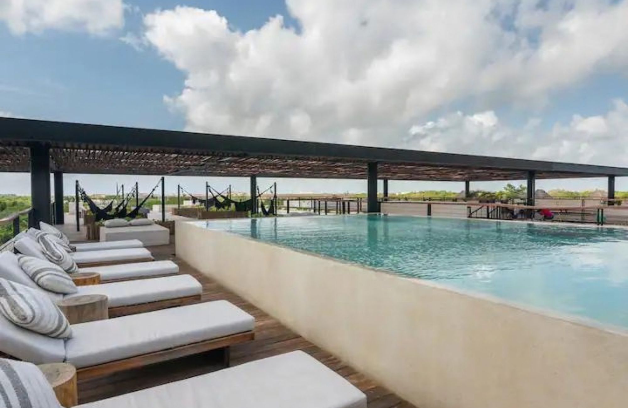 Condo with ocean view terrace, lock-off system, and pool, for sale, Tankah, Tulum.