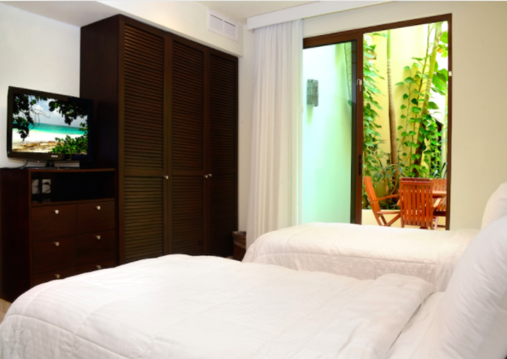 Condominium with private pool and garden, terrace, BBQ, for sale, Playacar, Playa del Carmen