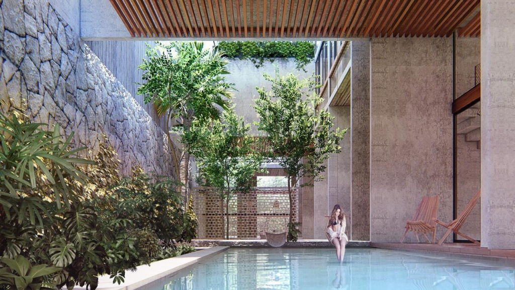 Hotel en venta en Tulum, concepto innovador, sobre avenida principal a pasos de las Ruinas Mayas.