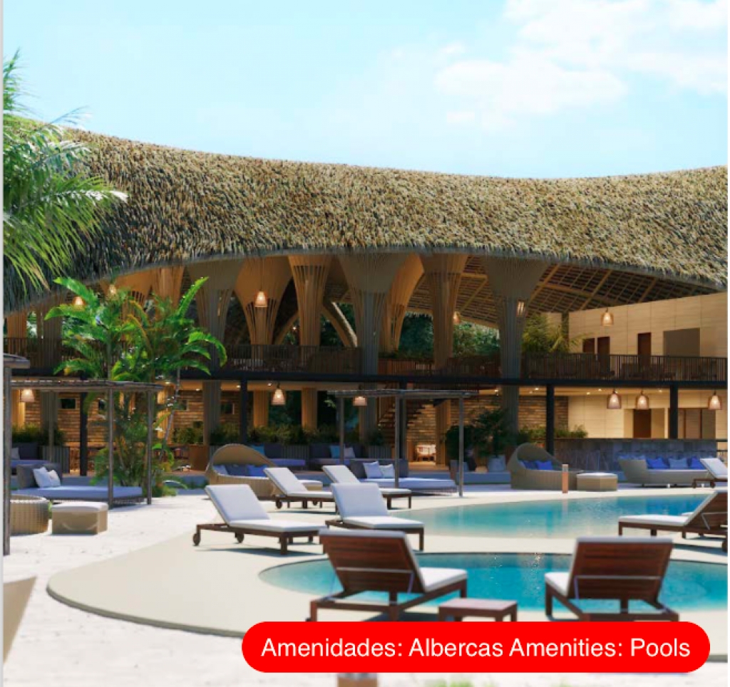 Lote multifamiliar en residencial de lujo con amenidades de hotel y acceso al mar en venta en Tulum.