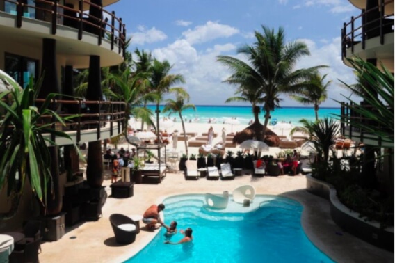 Beachfront condo, ground floor. spa, beach club, gym, for sale in Playa del Carmen.