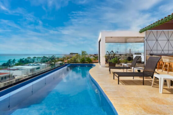 Turn-Key Studio with Ocean View Rooftop, Prime Downtown Playa del Carmen