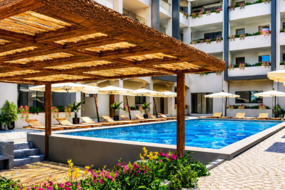 Bright apartment with terrace, swimming pool, and sun loungers for sale