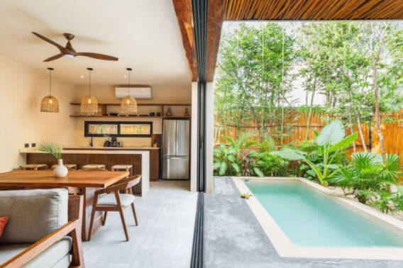 Luxury villa with pool, jacuzzi, and terrace for sale in Tulum.