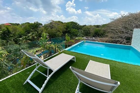 4-bedroom house, private pool, ocean access, 2 independent studios for sale in Playacar Phase 2.
