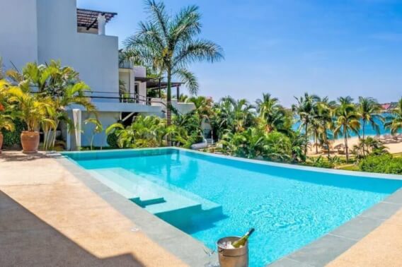 Oceanfront house with pool, beach club, Tangolunda Huatulco, for sale.