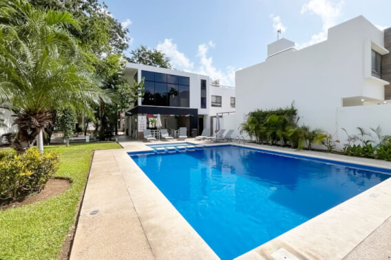 Semi-furnished two-story house in gated community with garden and pool, for sale