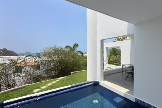 Condo with a private pool inside Camino Real Zaashila Resort with direct beach access