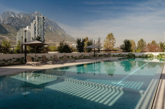 Modern condo with balcony, swimming pool, interactive water features, for sale