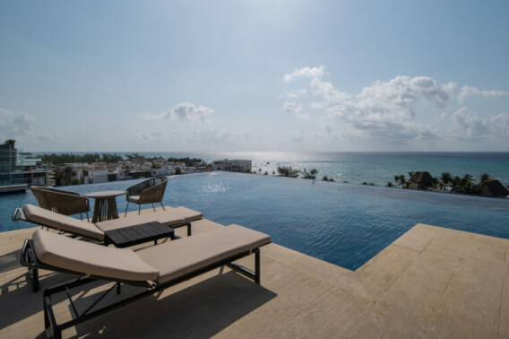 Condo con rooftop com&uacute;n y amenidades, en venta, Centro Playa del Carmen