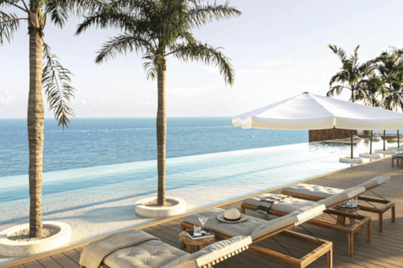 Condominio con vista al mar desde la alberca com&uacute;n, area de asador, acceso a la playa, en pre-construccion, venta Tankah Tulum.