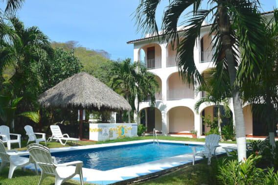 Apartment steps from the beach, pool, palapa, furnished, for sale Santa Cruz, Huatulco.