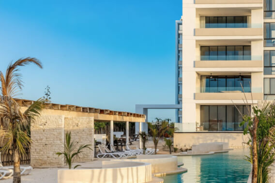 Condo steps from the beach, swimming pool, coworking space, terraces, for sale