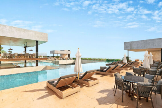 Condo steps from Fifth Avenue and the beach, rooftop, for sale Playa del Carmen.