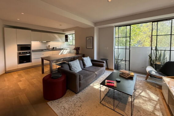Furnished condo for sale with city views from the balcony