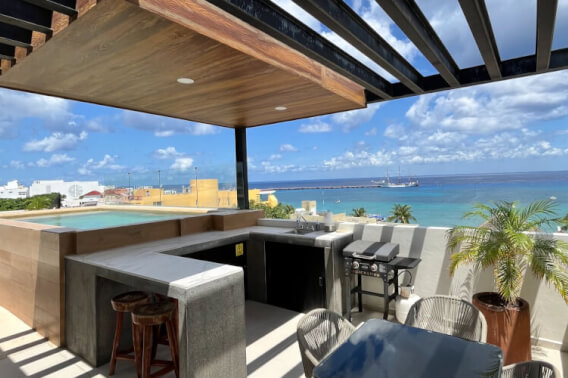 Ocean view condo common rooftop close to the sea boardwalk, for sale, downtown, Cozumel