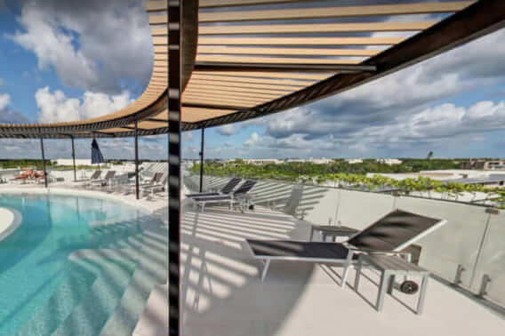 Condo with iconic pool, gym, concierge, terrace, restaurant, furnished, immediate delivery for sale The Panoramic, Tulum.