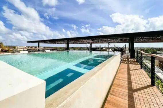 Designer condo with lock-off system and private pool, for sale
