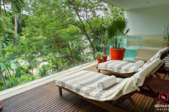 Condo with plunge pool, green view terrace, for sale at Ikal Living Playacar.