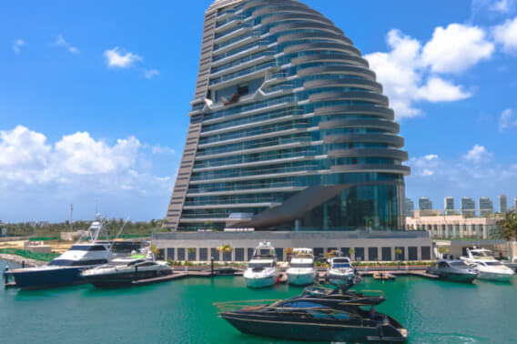 Luxury apartment with ocean and marina views, with amenities: infinity pool, spa, gym, lounge area, event room, lobby, in Puerto Canc&uacute;n