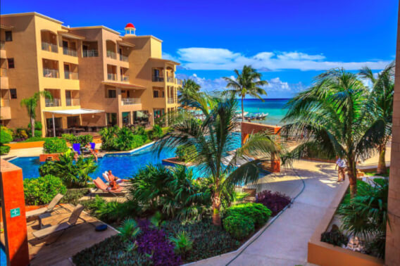 Beachfront  condo, jacuzzi, massage area, oceanview swimming pool with multiple ambiences and private terraces, steps from Fifth Avenue