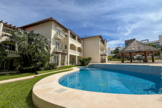 Fully furnished condo steps from the beach, for sale