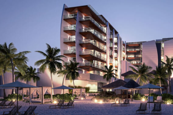 Two-story oceanfront penthouse with pool, pre-sale Playa del Carmen.